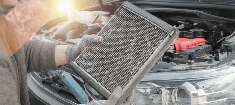 A-person-is-currently -working-on-replacing-the-A-C-Evaporator.