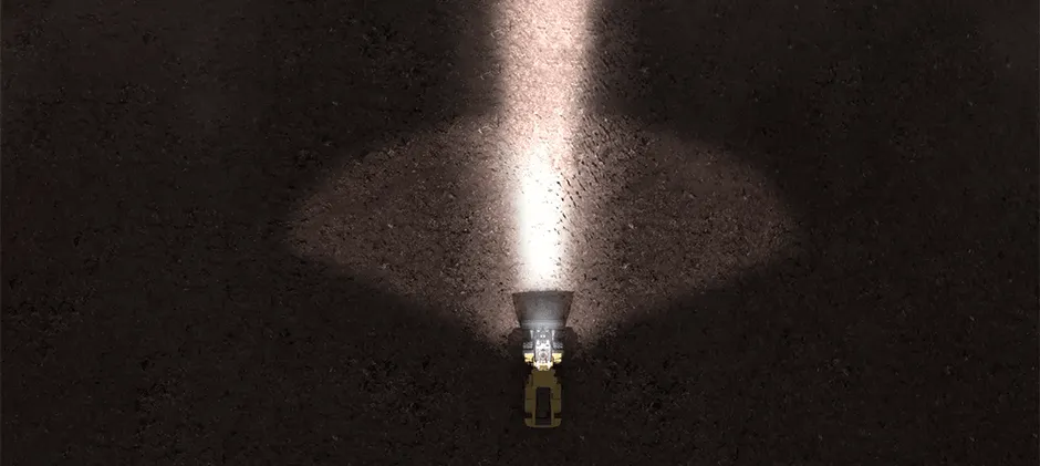 An illustration showing a combo beam pattern, combining both a wide flood and a long spot beam from an LED work light.