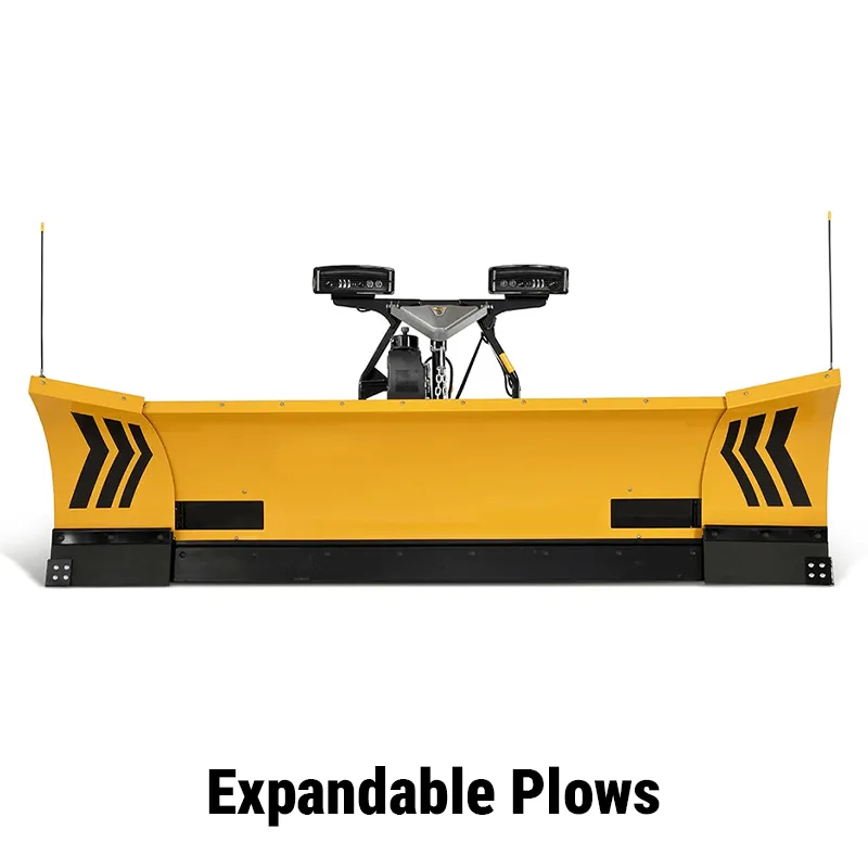 A yellow expandable wing snow plow for a skid steer, designed to change width for versatile clearing in both tight and open areas.