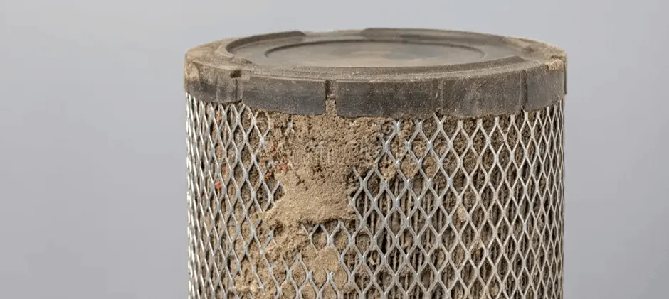 A close-up view of a severely clogged air make engine starts but won't stay running
